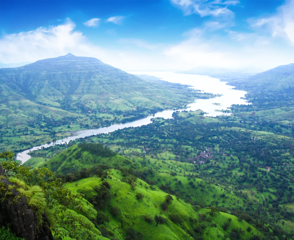 Lush green Mahabaleshwar valley with clouds during September monsoon